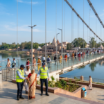 A20clean20professional20cinematic20wide20shot20of20the20grand20suspension20footover20bridge20over20falgu20river20connecting20vishnupad20and20sitakund20in20gaya20under20natural20lighting